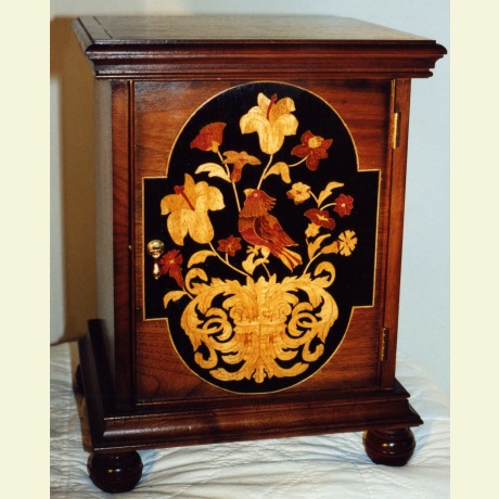 Marquetry bird veneered cabinet. Marquetry done in a vacuum press