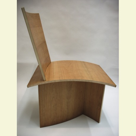 Bent laminated veneered chair. Bent laminating and veneer done in a vacuum press