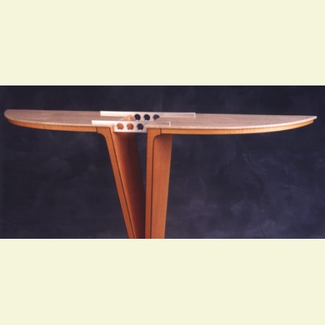 Modern veneered table. Veneer applied with a vacuum press