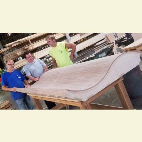 Large bent laminated piece created with a vacuum press