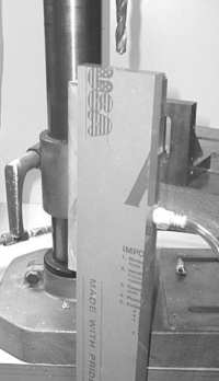 Drill press vacuum clamping jig in use