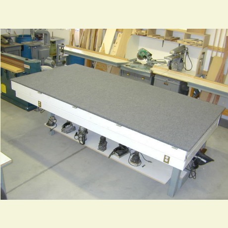 Vacuum press storage table