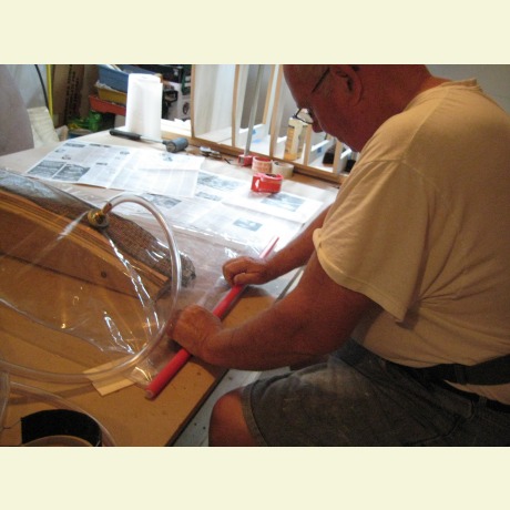 Creating a bent laminted drawer in a vacuum bag
