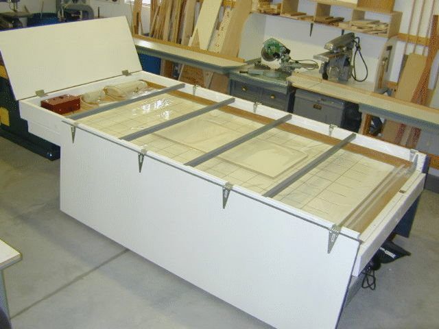 Storage table for vacuum veneering bag open